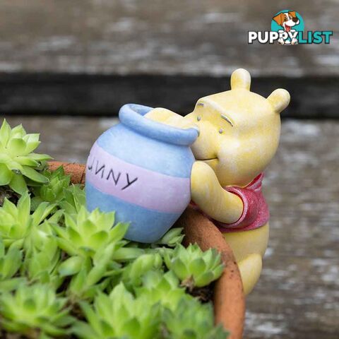 Pot Buddies: Winnie The Pooh Holding Hunny Pot - Jardinopia Garden Decor - 5060733455626