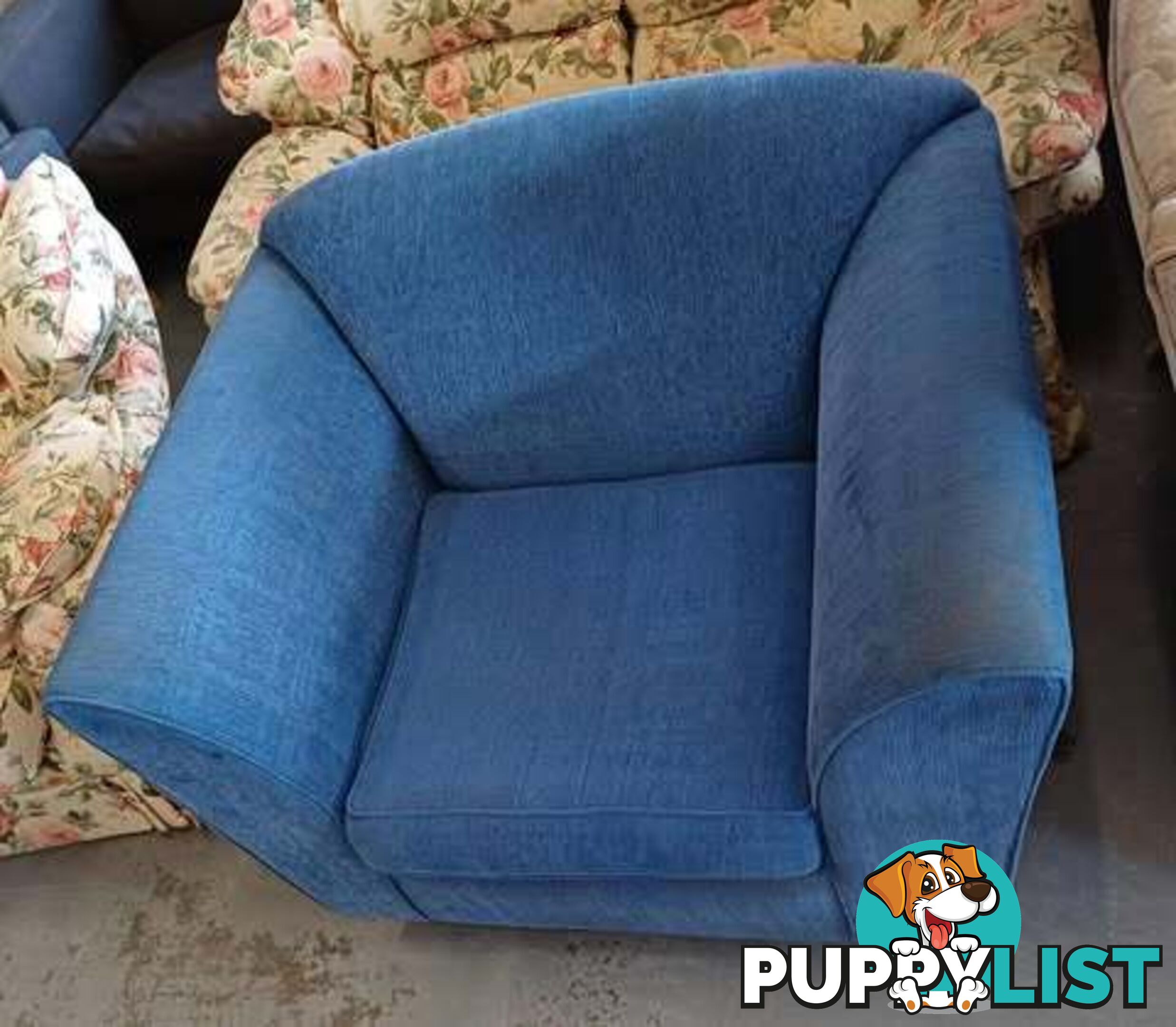 Extra Large very comfortable blue single lounge chair.
