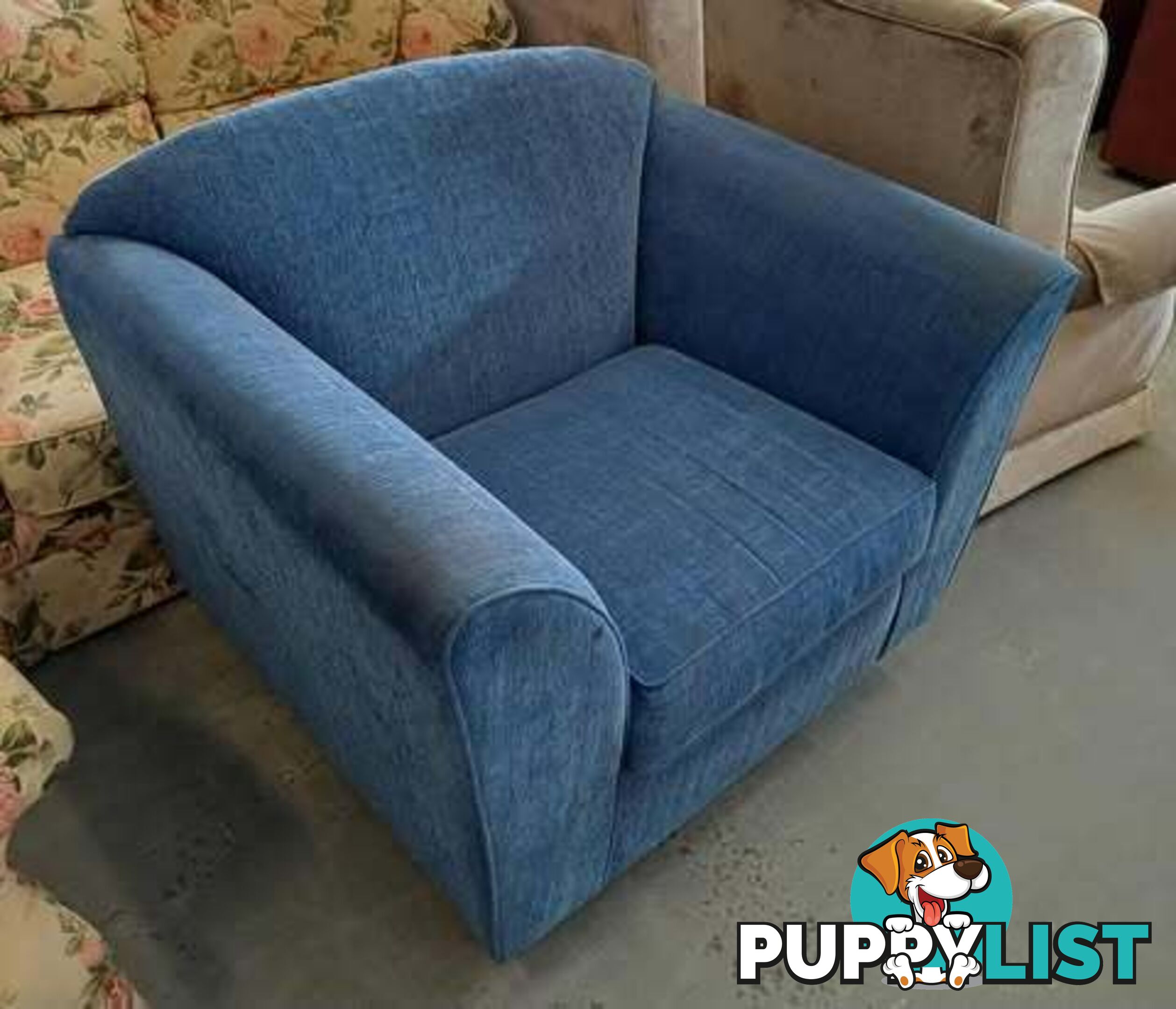 Extra Large very comfortable blue single lounge chair.