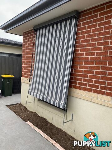 Outdoor window awning