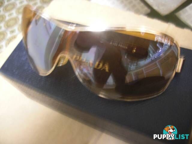 *PRADA SUNGLESSES GOLD FRAMES AND LENS PICKUP OR POSTAGE 9.99