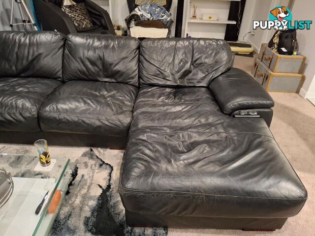 This beautiful Genuine Black Leather 6  seater Couch is very comfy and big. 0408985133