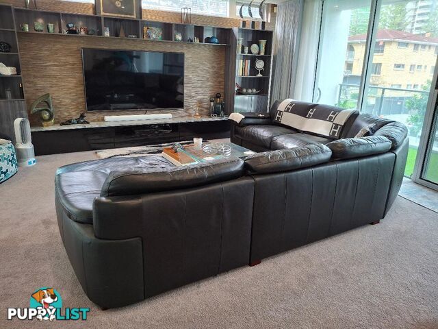This beautiful Genuine Black Leather 6  seater Couch is very comfy and big. 0408985133