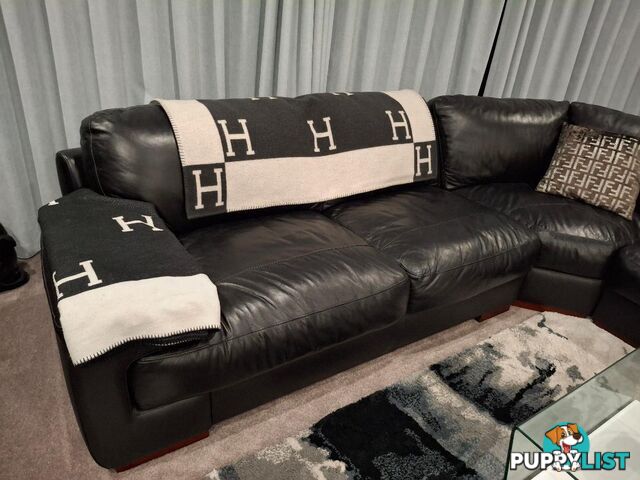 This beautiful Genuine Black Leather 6  seater Couch is very comfy and big. 0408985133