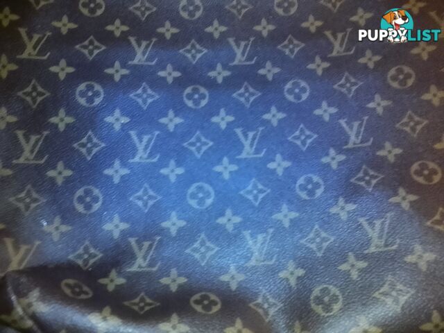 Genuine lui Vuitton clutch bag