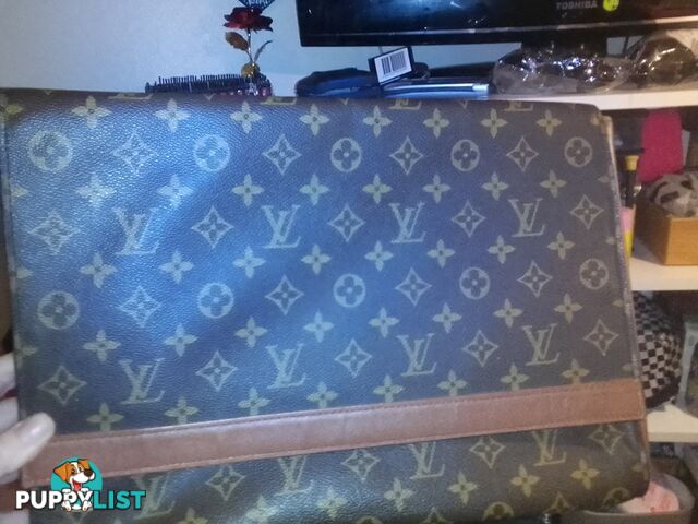 Genuine lui Vuitton book bag