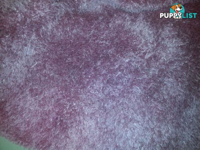 pink shaggy rug