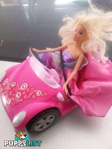 barbie and her car