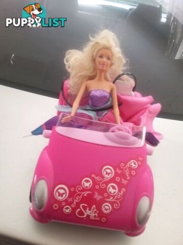 barbie doll and her car