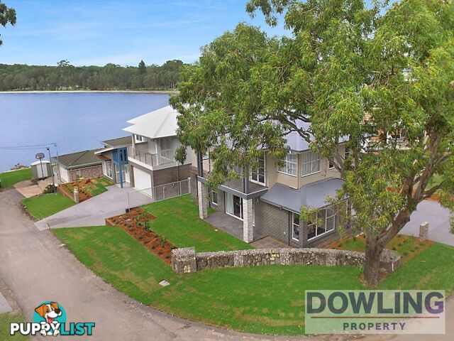 48 Caswell Crescent TANILBA BAY NSW 2319