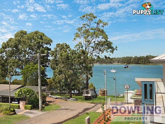 48 Caswell Crescent TANILBA BAY NSW 2319