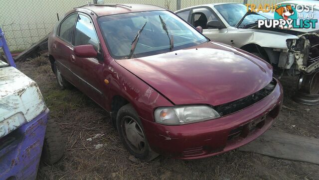 10/94 Ford Laser KJ2 4Dr Hatch Manual 1.8 Petrol DOOR LR