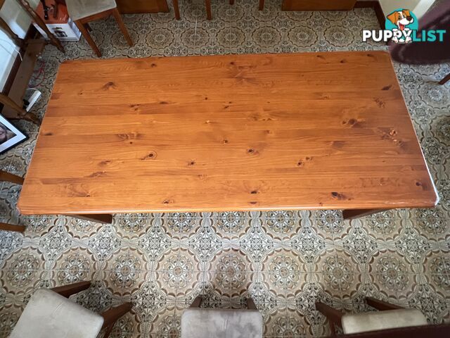 Timber dining table and 8 chairs