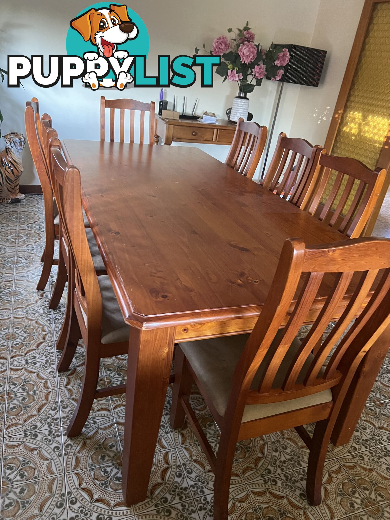 Timber dining table and 8 chairs