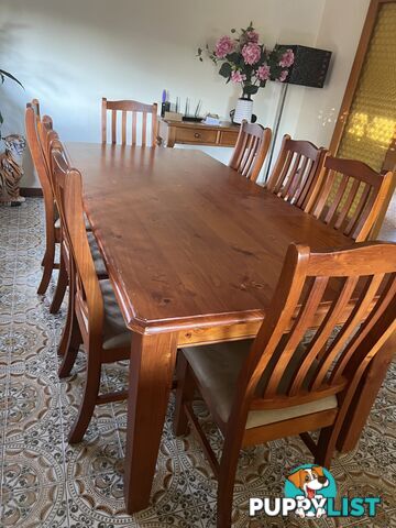 Timber dining table and 8 chairs