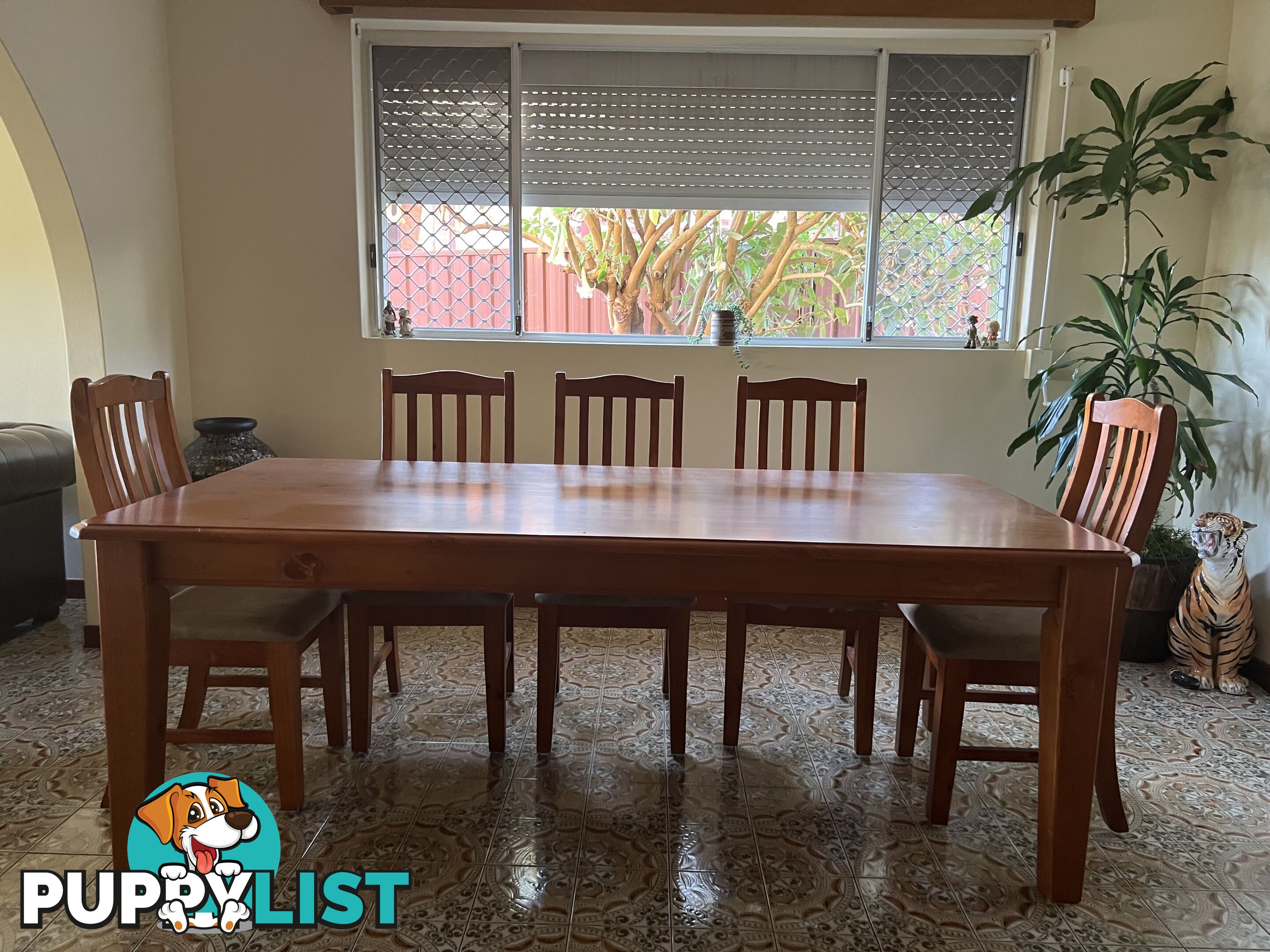 Timber dining table and 8 chairs