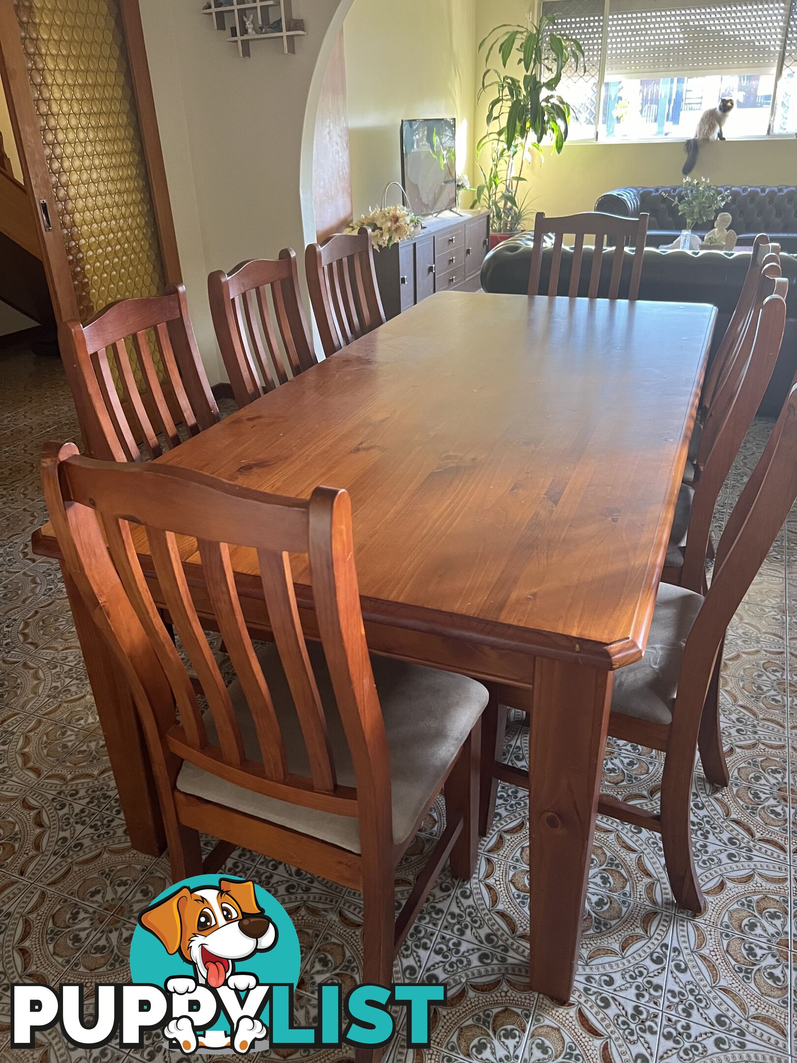 Timber dining table and 8 chairs