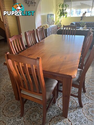 Timber dining table and 8 chairs