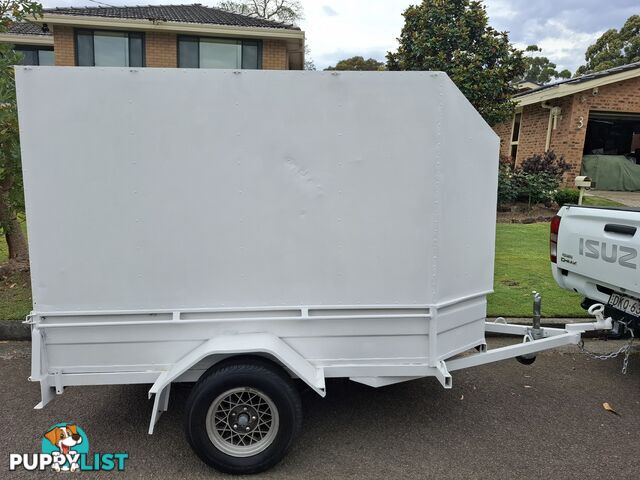 Enclosed trailer.