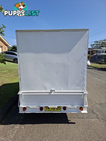 Enclosed trailer.