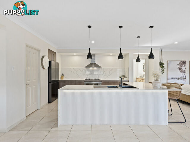 7 Minyon Court PACIFIC PINES QLD 4211
