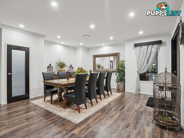54 Mcauley Parade PACIFIC PINES QLD 4211