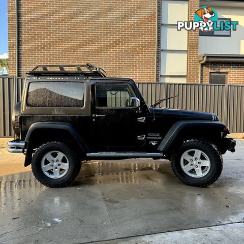 2013 Black Jeep Wrangler Sport 4x4