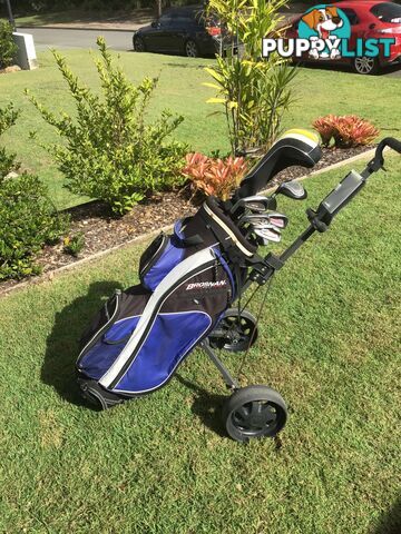 Left handed golf clubs, bag and trolley