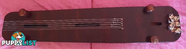 Acoustic Combo ( Guqin/Dog Bowl Resonator) with Tremolo Feature.