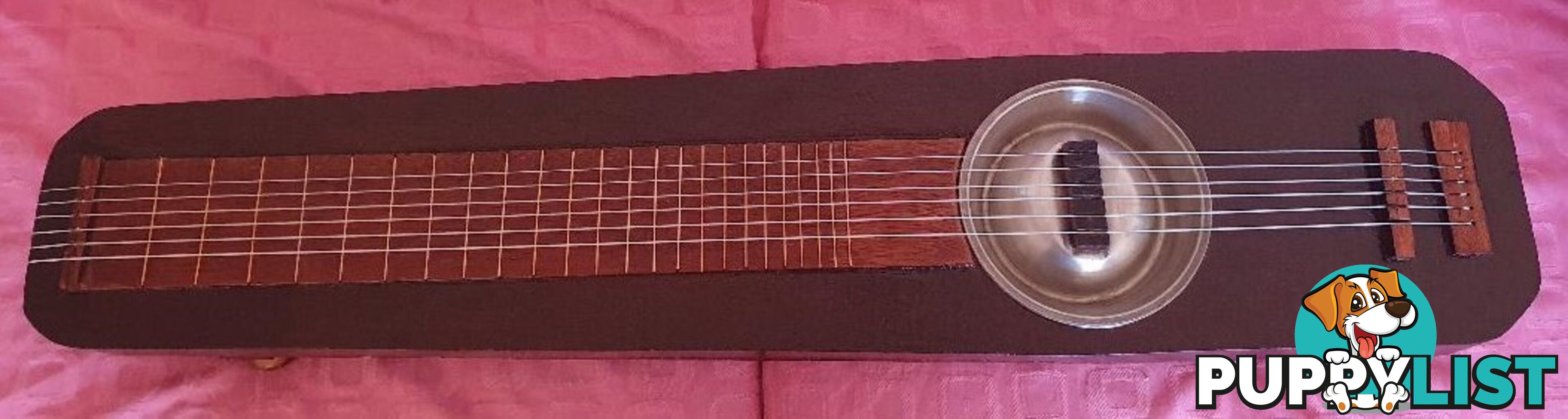 Acoustic Combo ( Guqin/Dog Bowl Resonator) with Tremolo Feature.