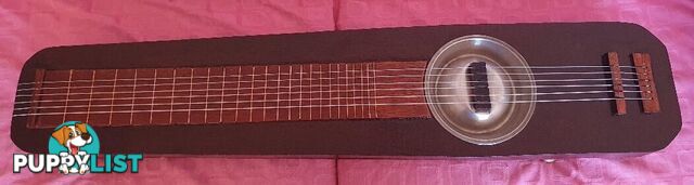 Acoustic Combo ( Guqin/Dog Bowl Resonator) with Tremolo Feature.