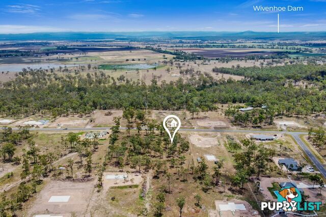 31 Poinciana Avenue RIFLE RANGE QLD 4311