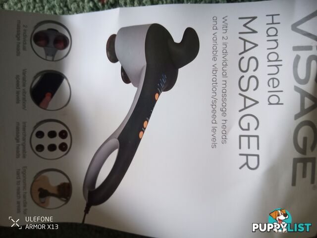 Visage handheld massager with variety.