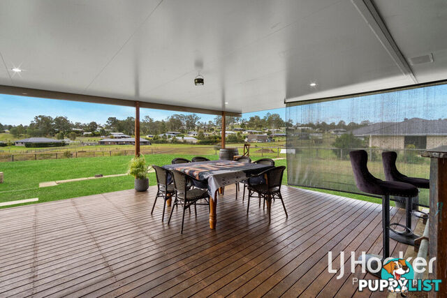 115-119 Munroe Drive WOODHILL QLD 4285