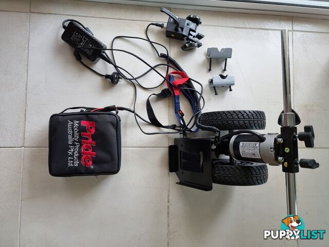 Powerassist power pack for manual wheelchair