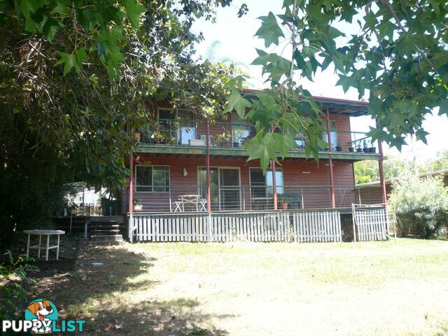 106 High Central Road MACLEAY ISLAND QLD 4184