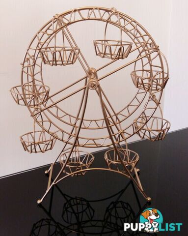 Gold ferris wheel cupcake stand available now for hire!