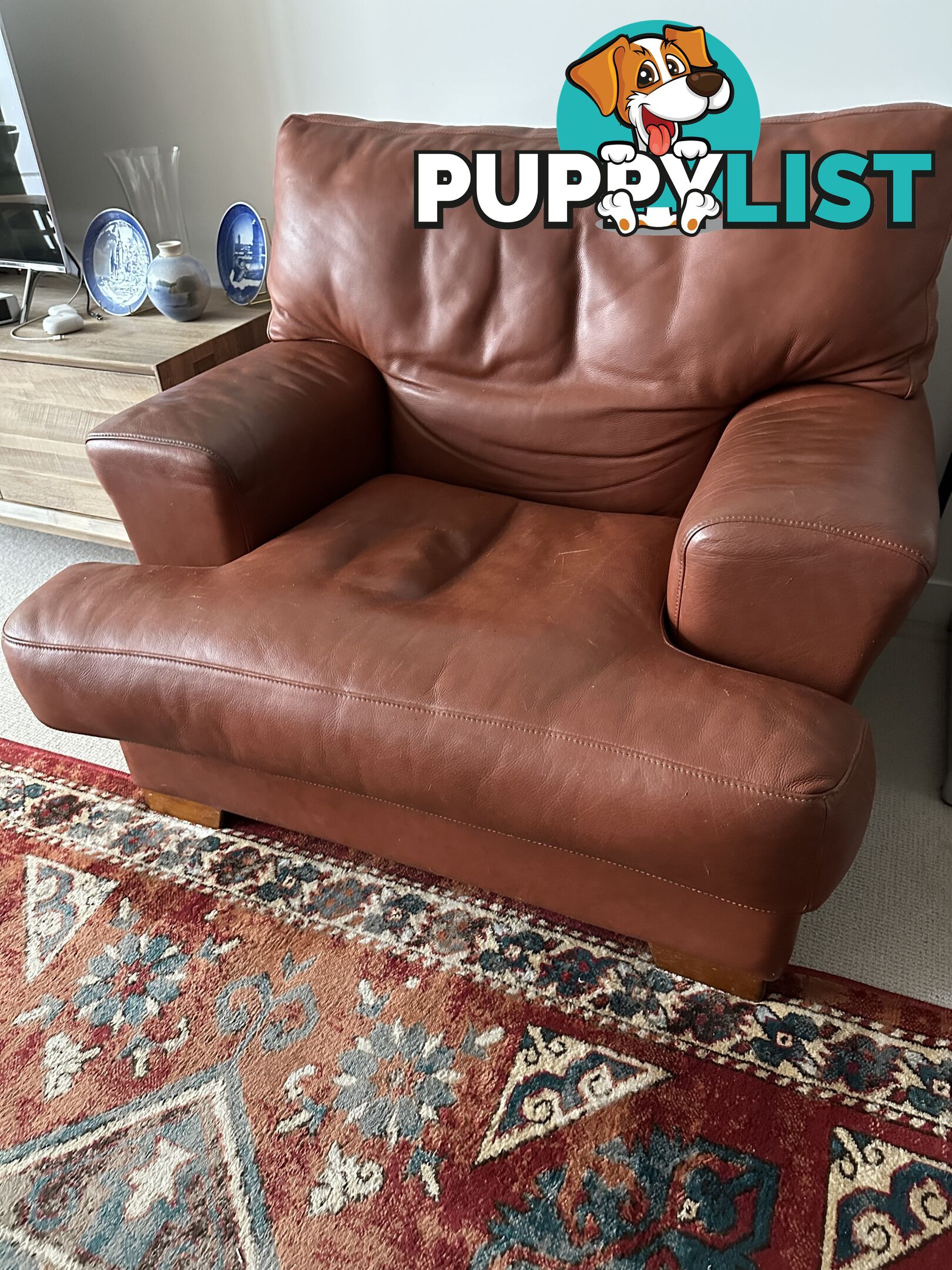 Brown leather occasional chair