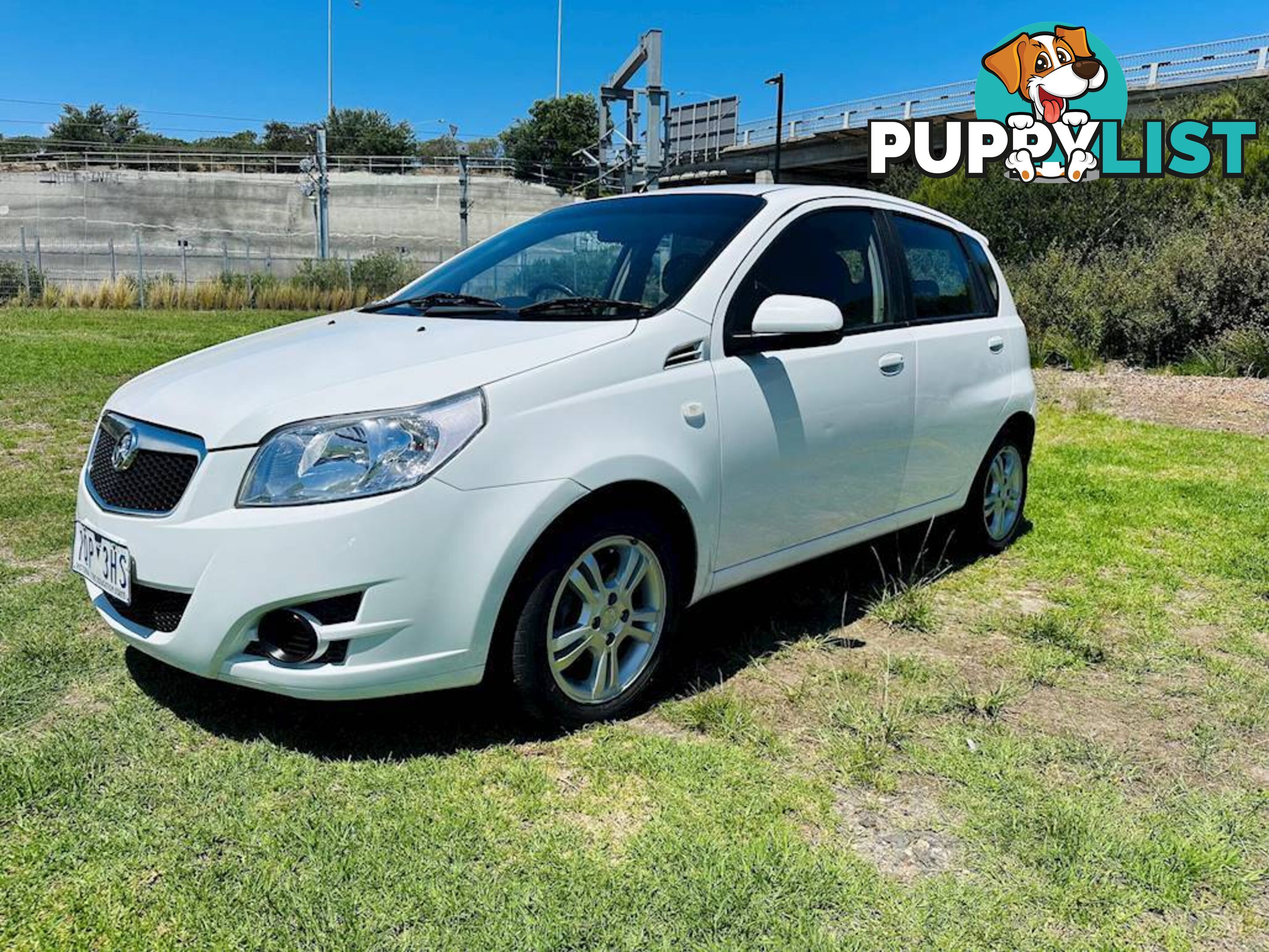 2011  HOLDEN BARINA  TK MY11 HATCHBACK