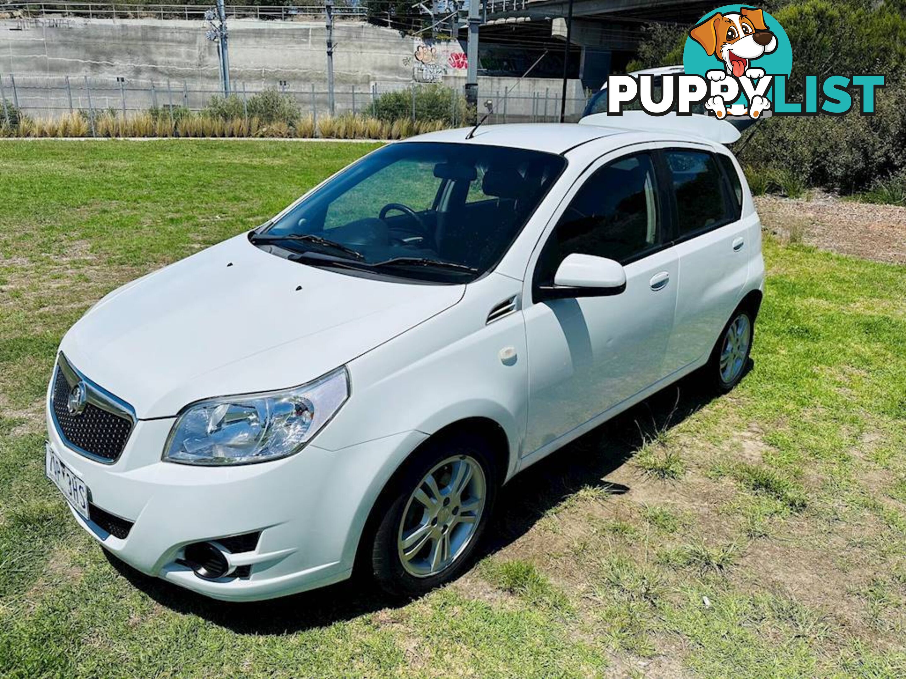 2011  HOLDEN BARINA  TK MY11 HATCHBACK