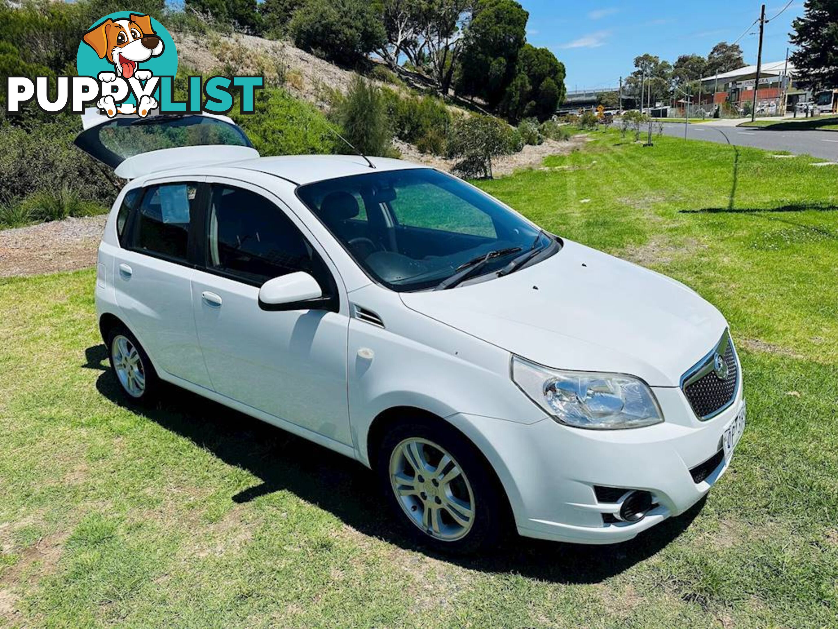 2011  HOLDEN BARINA  TK MY11 HATCHBACK