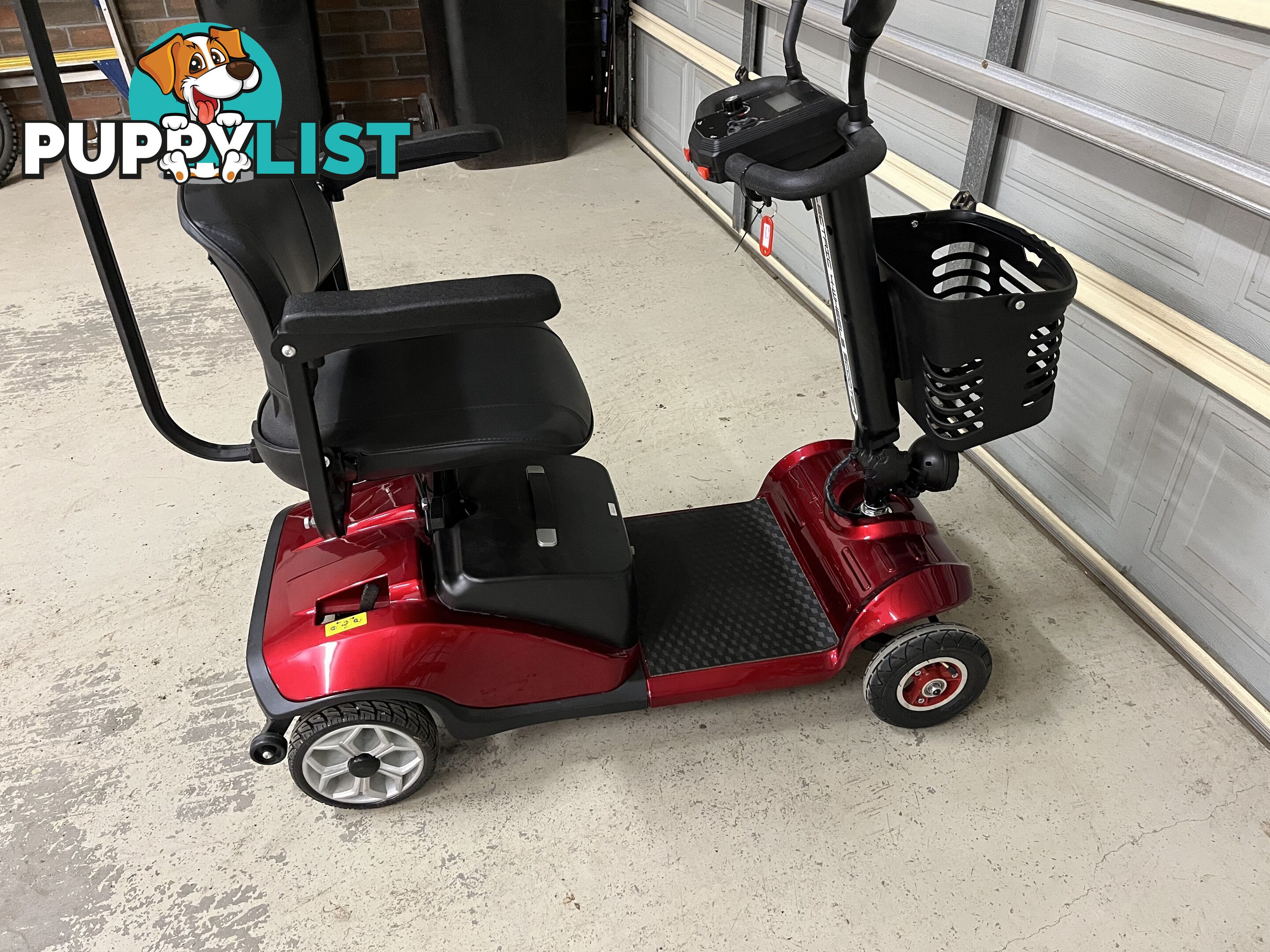 Red Mobility Scooter with Umbrella