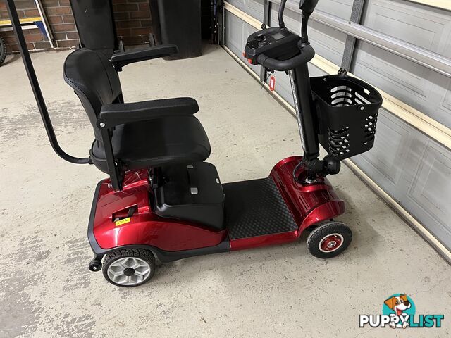 Red Mobility Scooter with Umbrella
