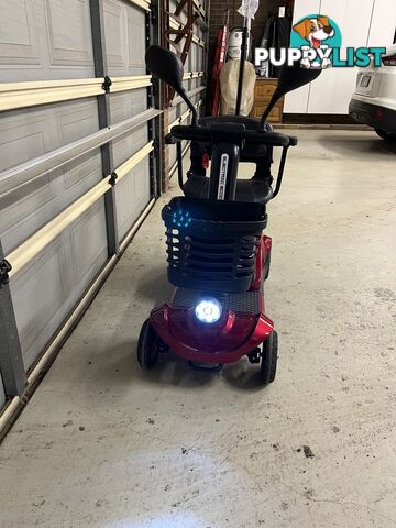 Red Mobility Scooter with Umbrella