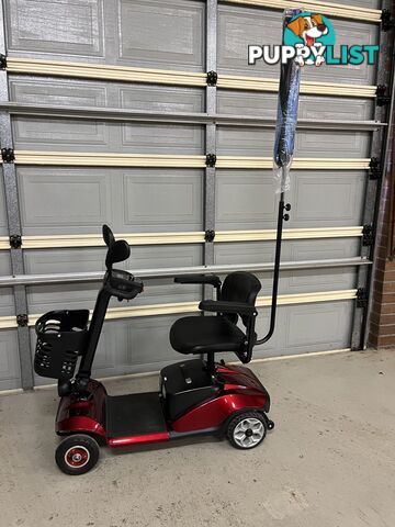 Red Mobility Scooter with Umbrella