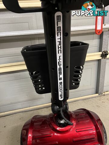 Red Mobility Scooter with Umbrella