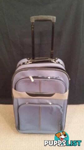 Assorted Suit Cases - Carry on Luggage