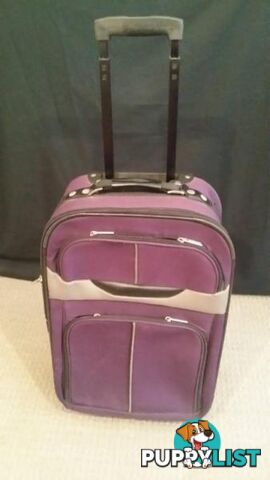 Assorted Suit Cases - Carry on Luggage