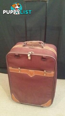 Assorted Suit Cases - Carry on Luggage