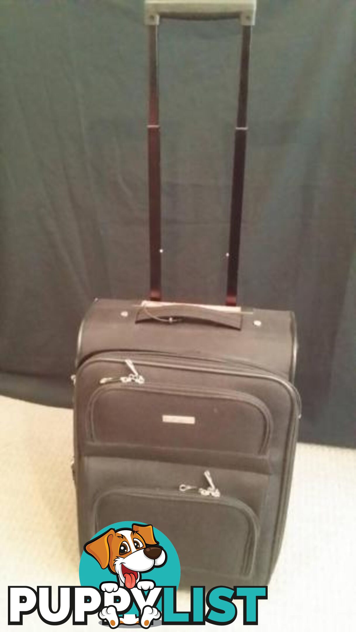 Assorted Suit Cases - Carry on Luggage